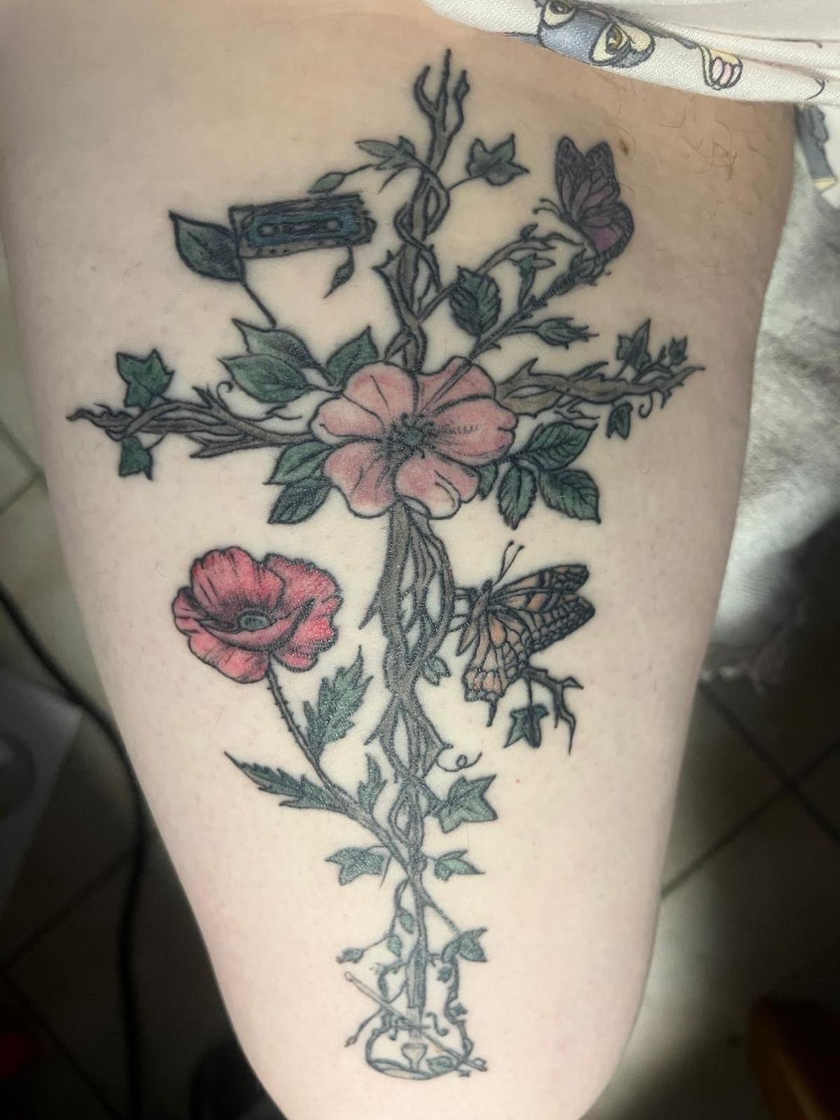 Le tatouage de croix : signification et personnalisation à Villeneuve-sur-Bellot